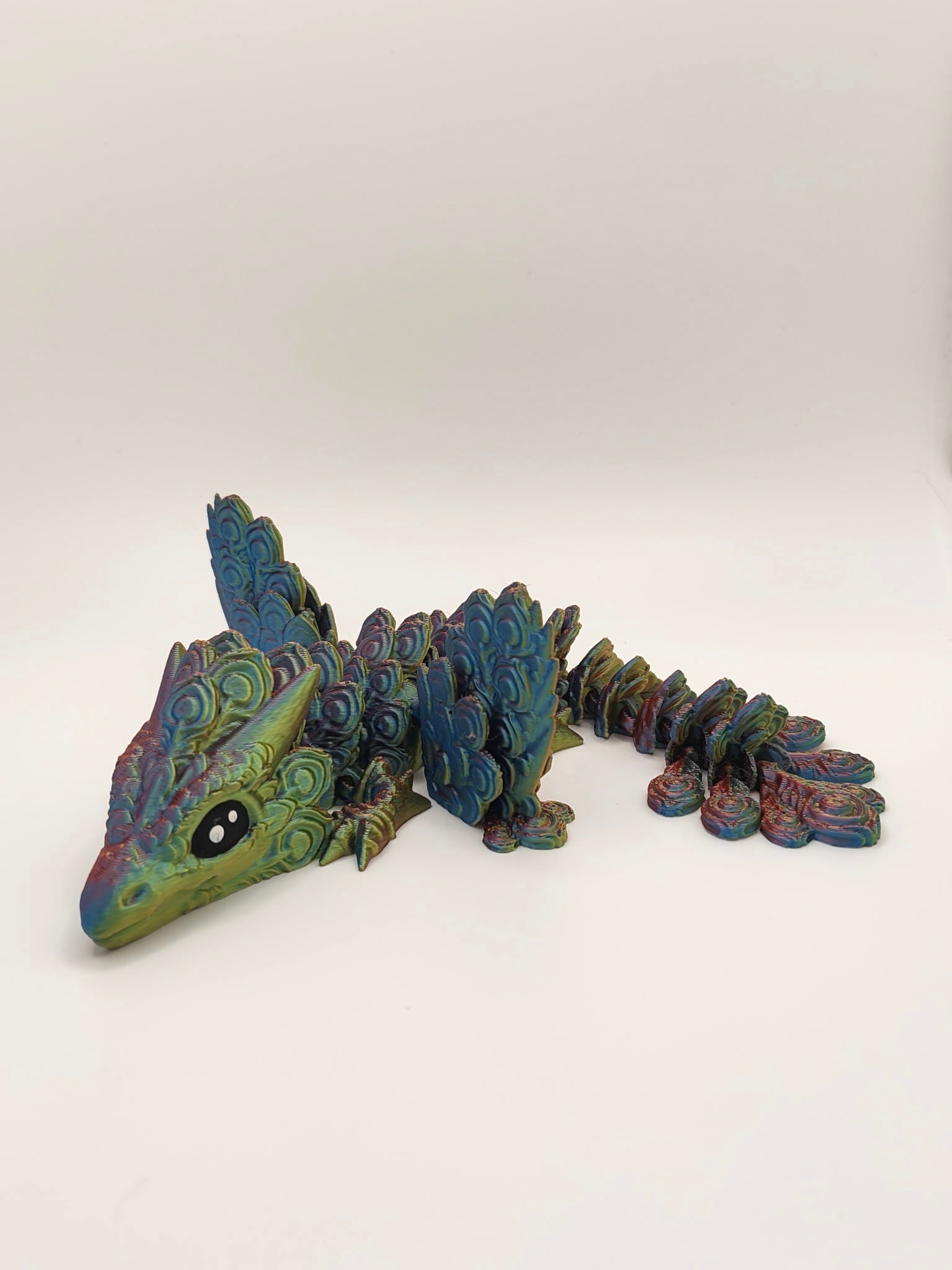 Baby Winged Peacock Dragon
