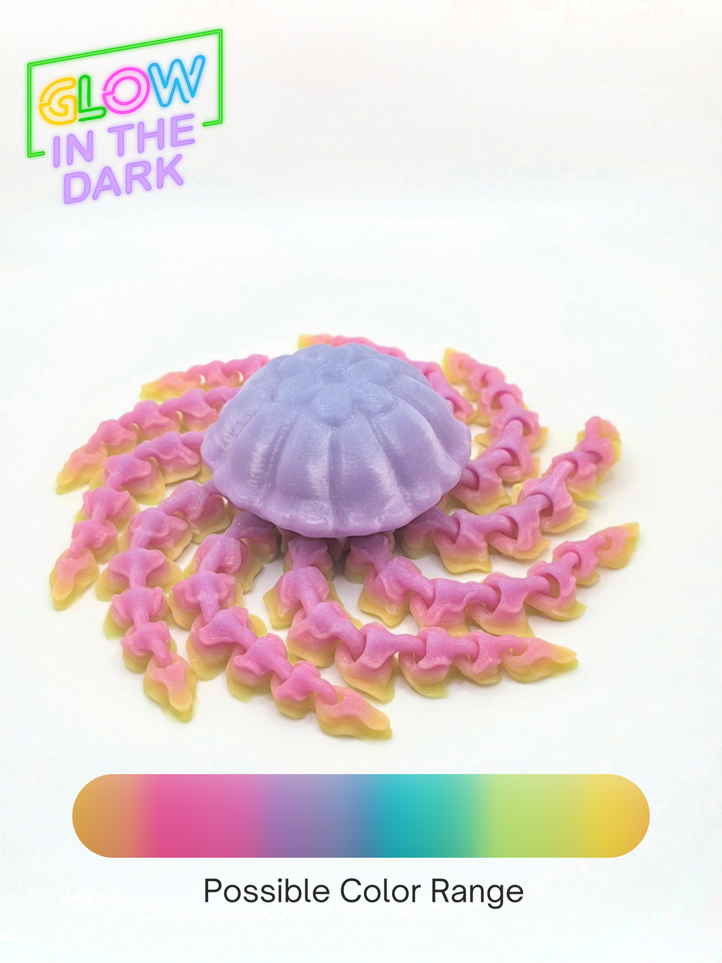 Detailed glow-in-the-dark articulated 3D printed jellyfish with flexible tentacles on a white background.